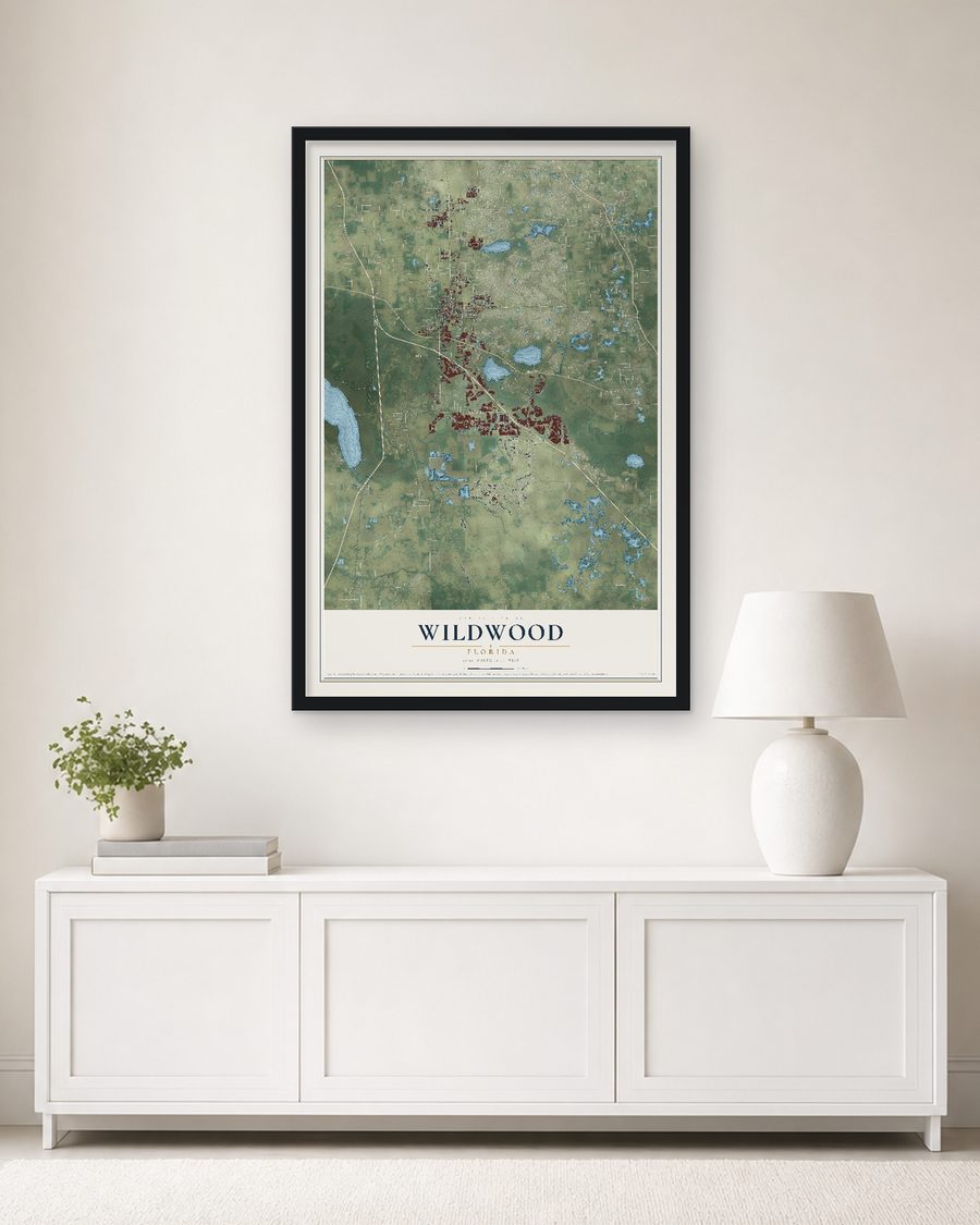 The Wildwood, Florida map, 24 x 36 in, in a black wood frame on a living room wall