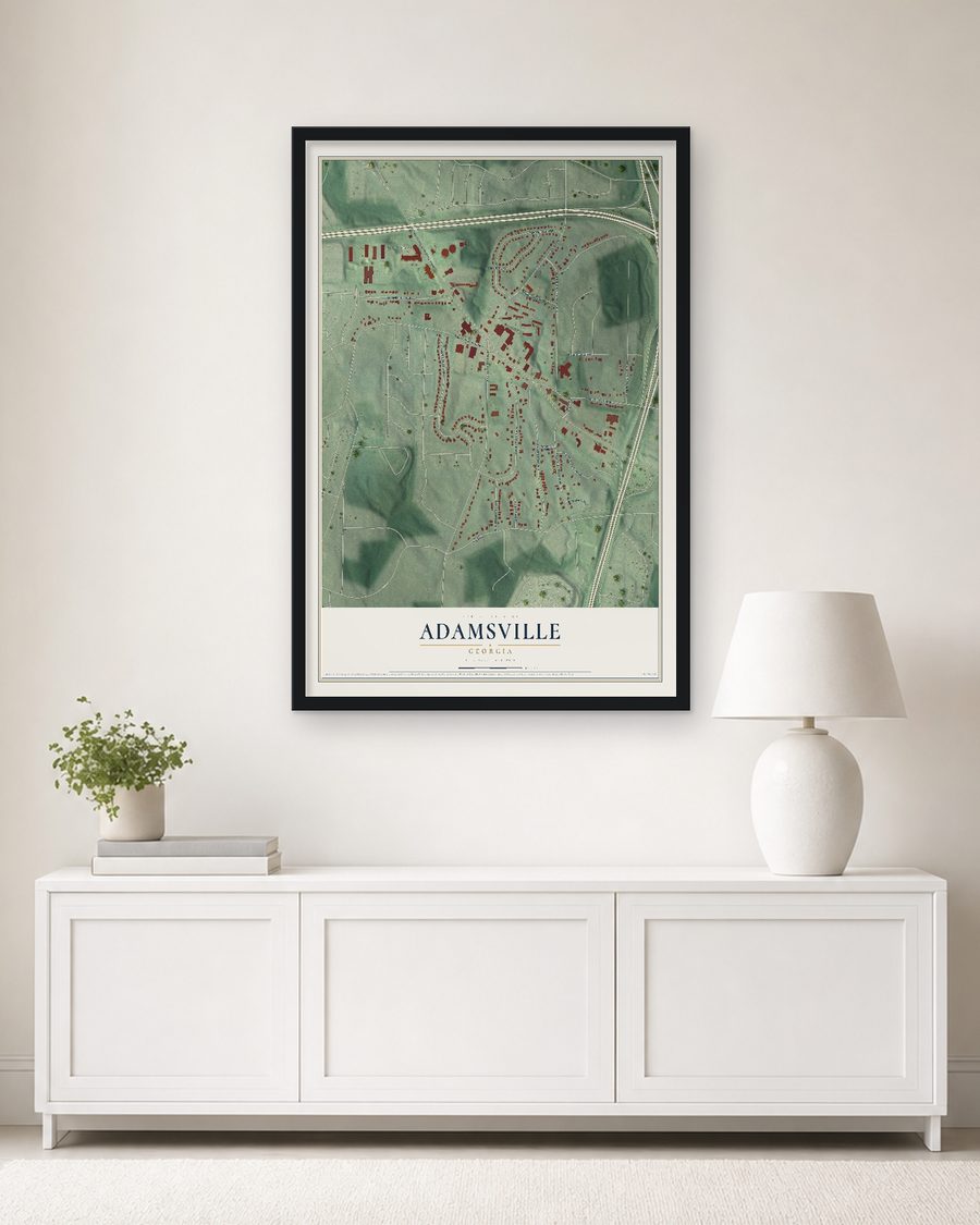The Adamsville, Georgia map, 24 x 36 in, in a black wood frame on a living room wall