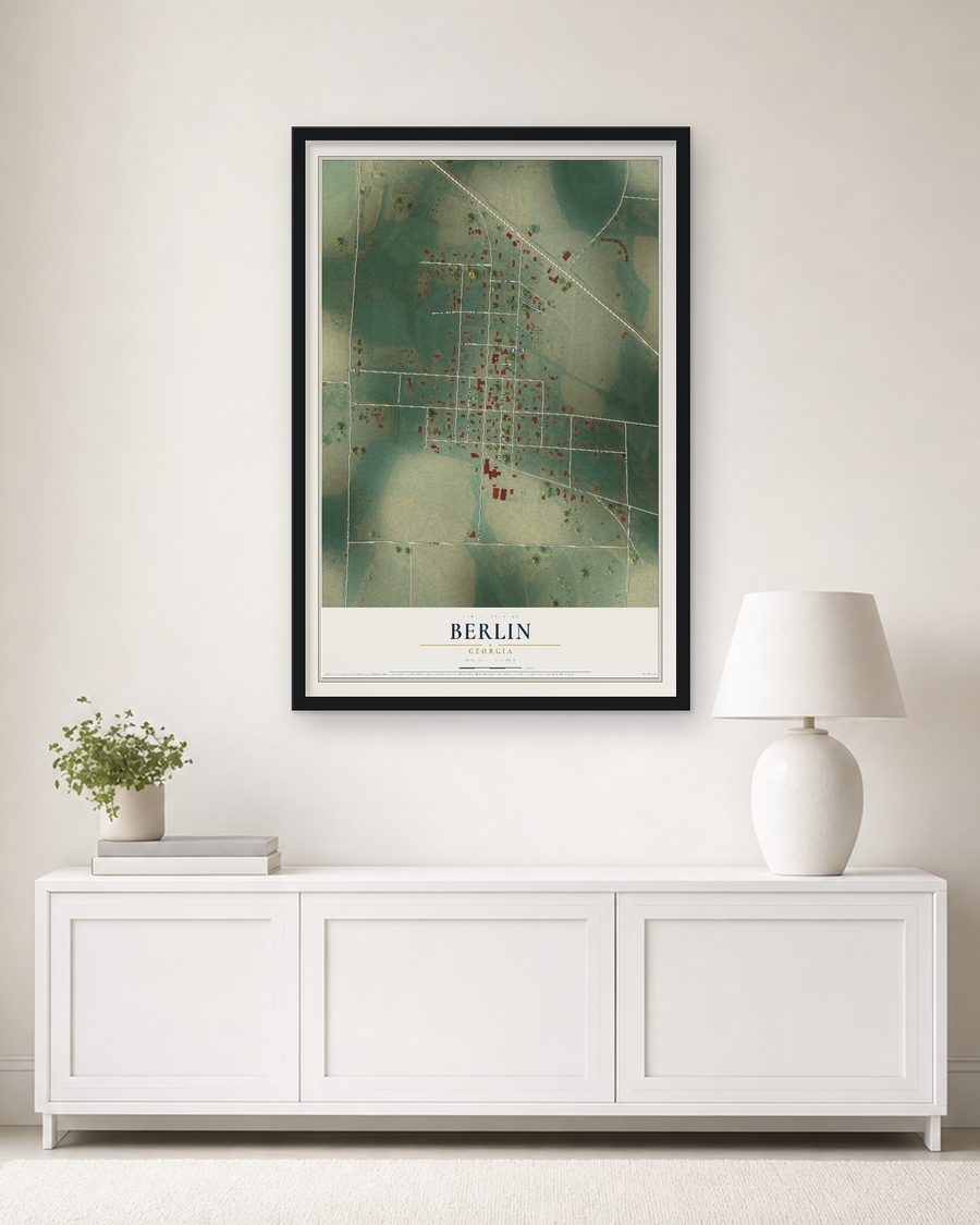 The Berlin, Georgia map, 24 x 36 in, in a black wood frame on a living room wall