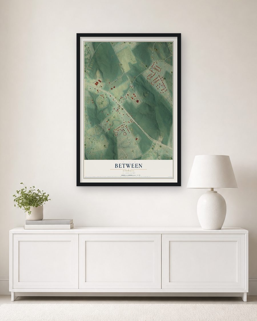 The Between, Georgia map, 24 x 36 in, in a black wood frame on a living room wall