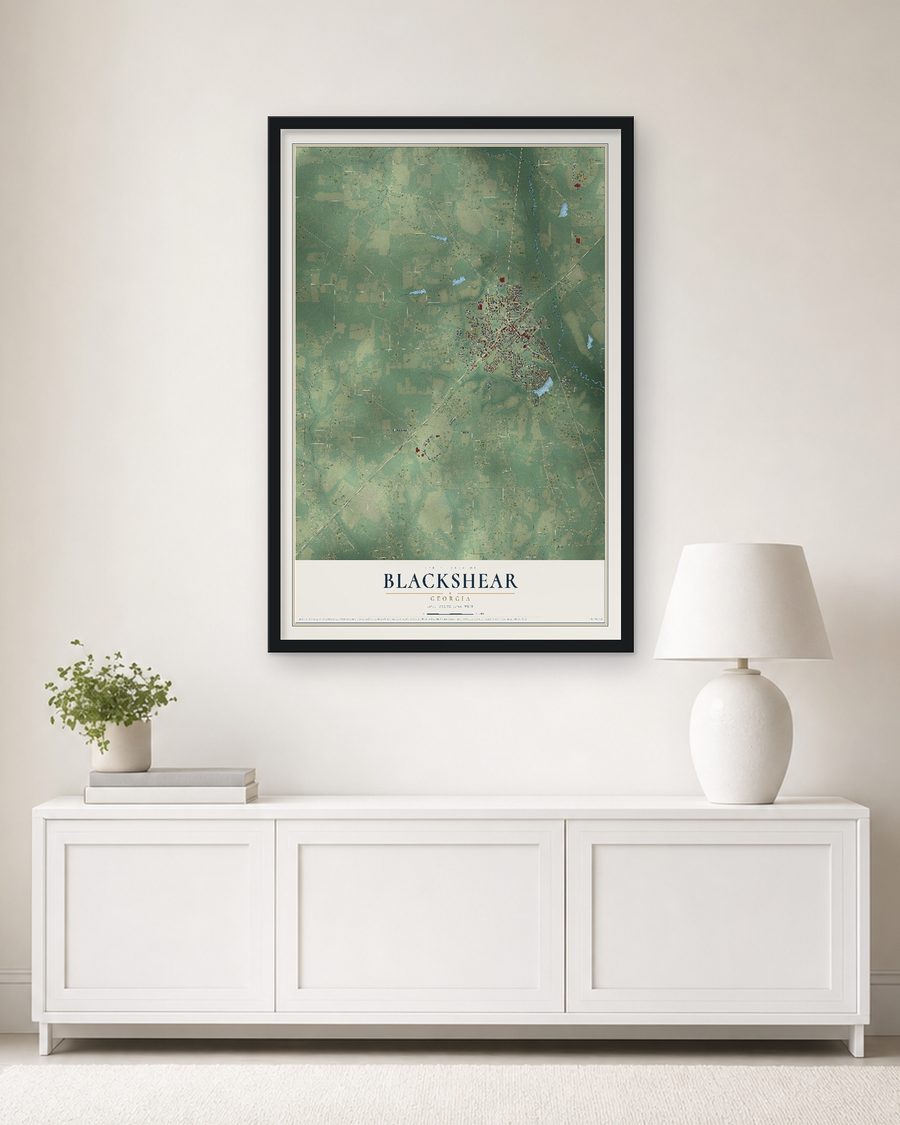 The Blackshear, Georgia map, 24 x 36 in, in a black wood frame on a living room wall