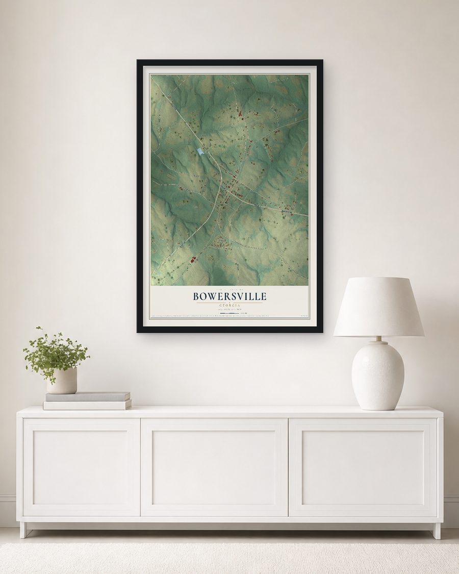 The Bowersville, Georgia map, 24 x 36 in, in a black wood frame on a living room wall