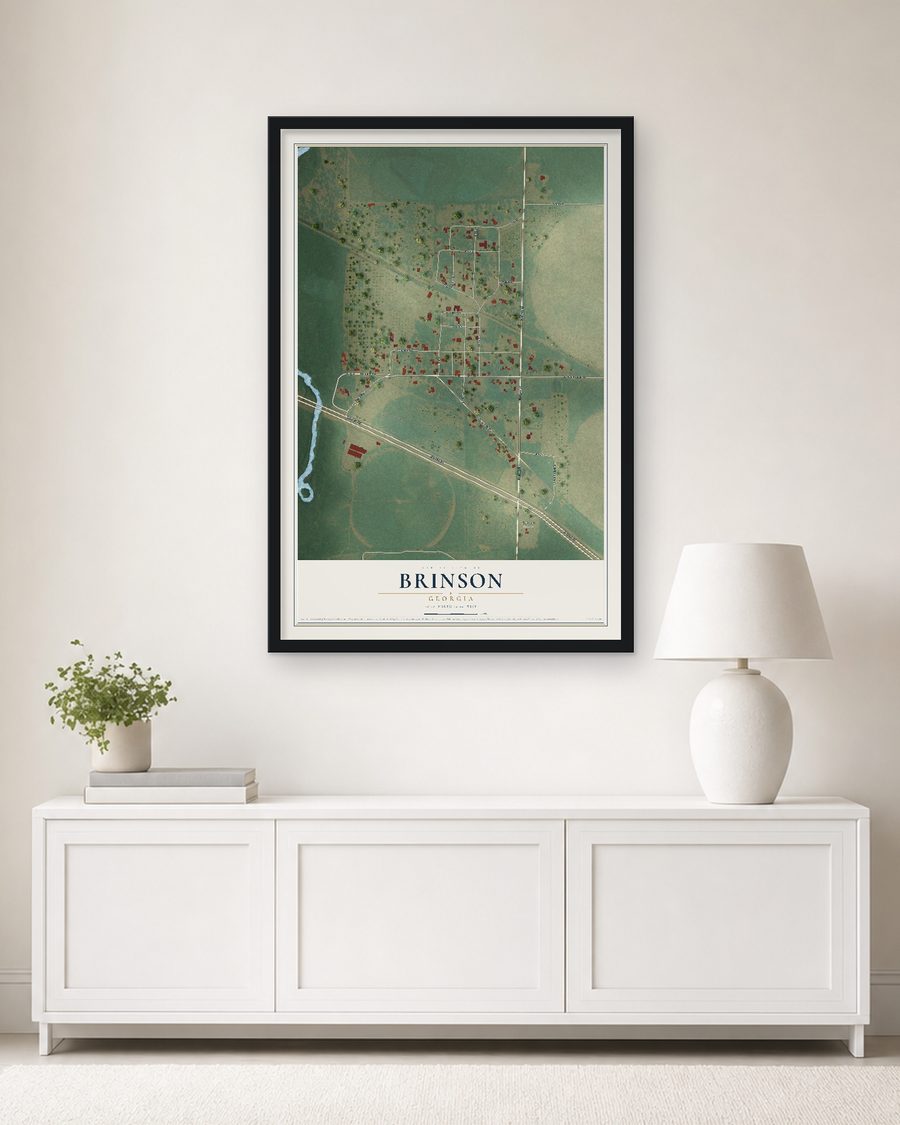 The Brinson, Georgia map, 24 x 36 in, in a black wood frame on a living room wall