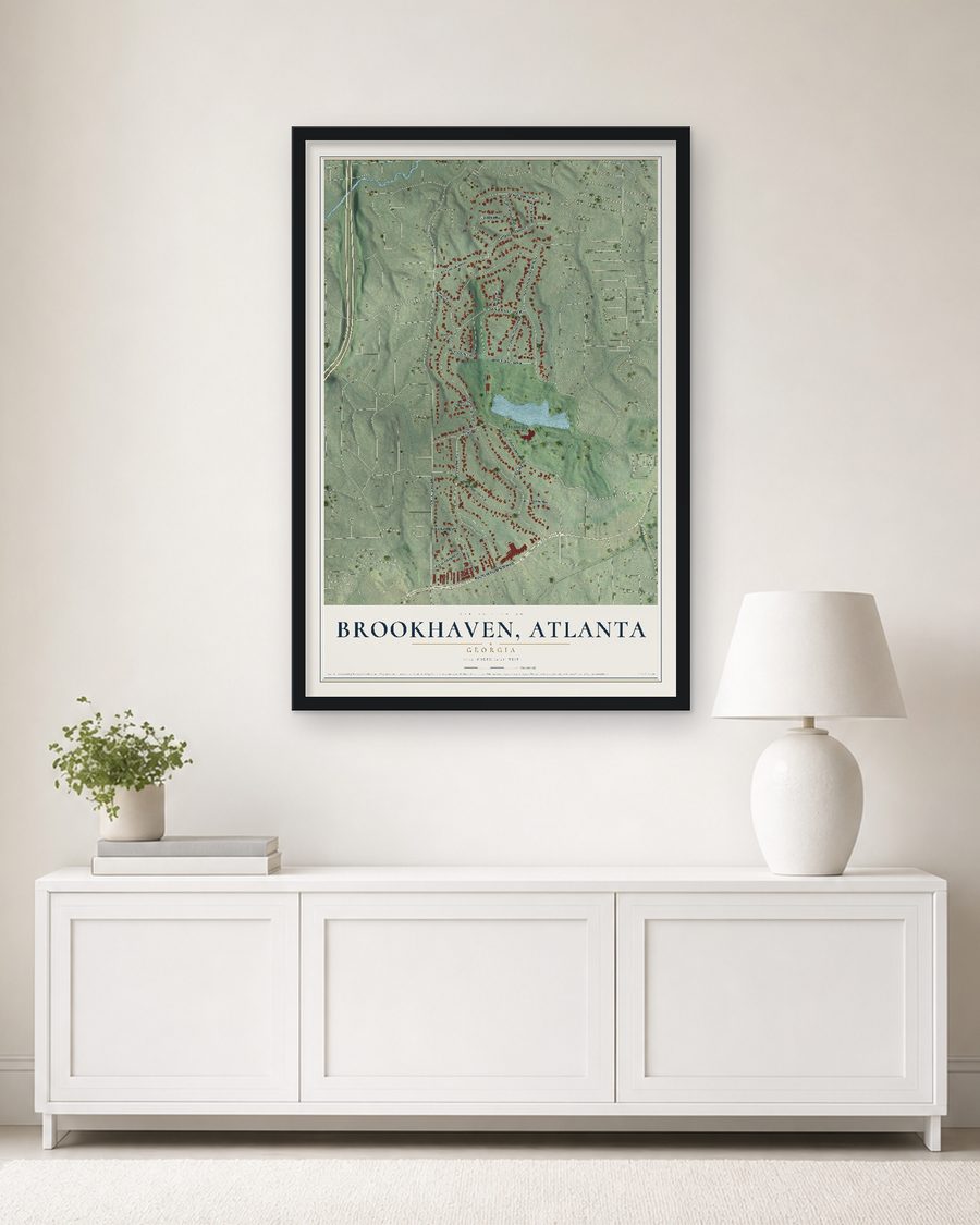 The Brookhaven, Atlanta, Georgia map, 24 x 36 in, in a black wood frame on a living room wall
