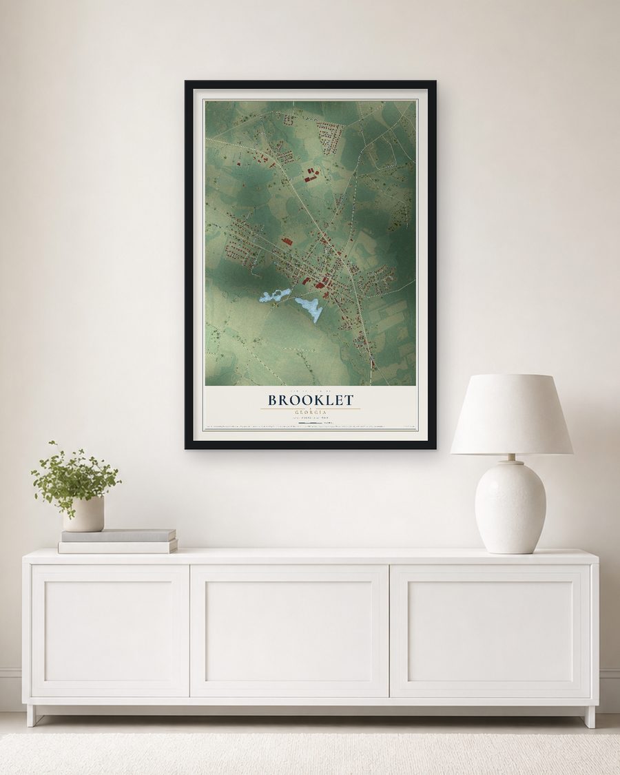 The Brooklet, Georgia map, 24 x 36 in, in a black wood frame on a living room wall