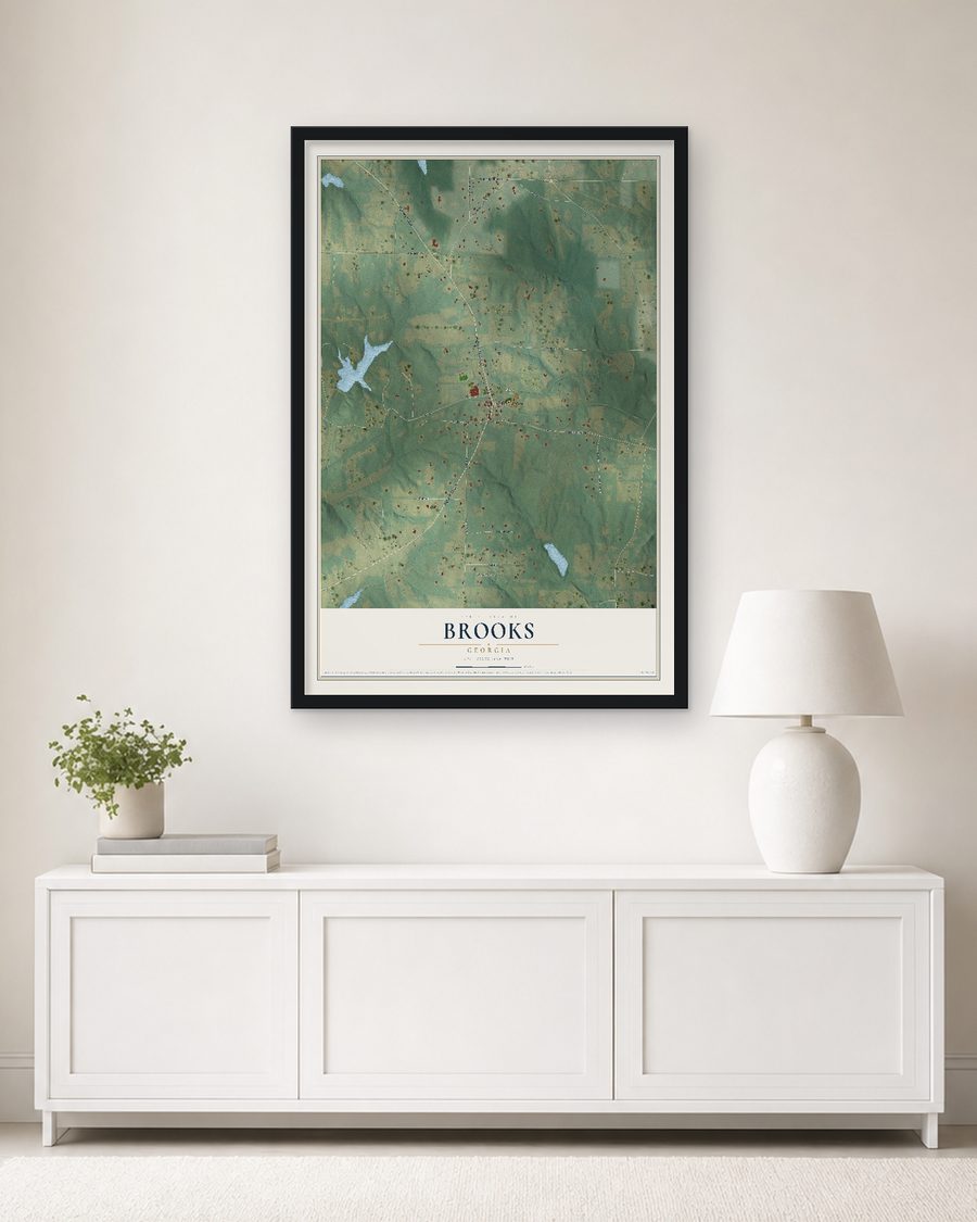 The Brooks, Georgia map, 24 x 36 in, in a black wood frame on a living room wall