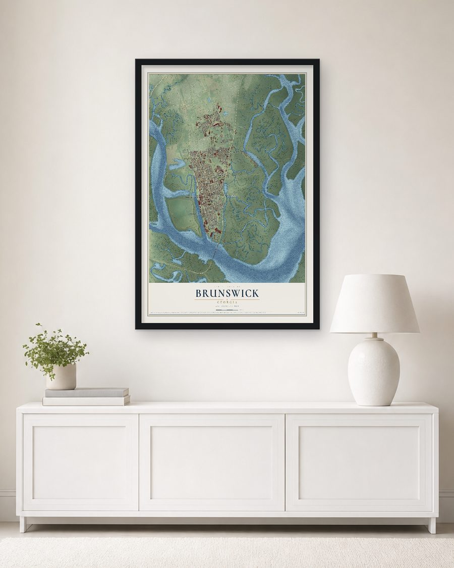 The Brunswick, Georgia map, 24 x 36 in, in a black wood frame on a living room wall