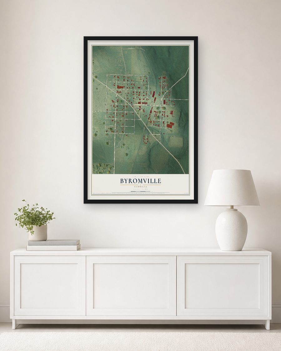 The Byromville, Georgia map, 24 x 36 in, in a black wood frame on a living room wall