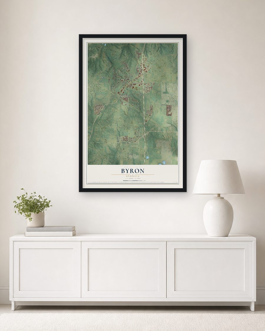 The Byron, Georgia map, 24 x 36 in, in a black wood frame on a living room wall