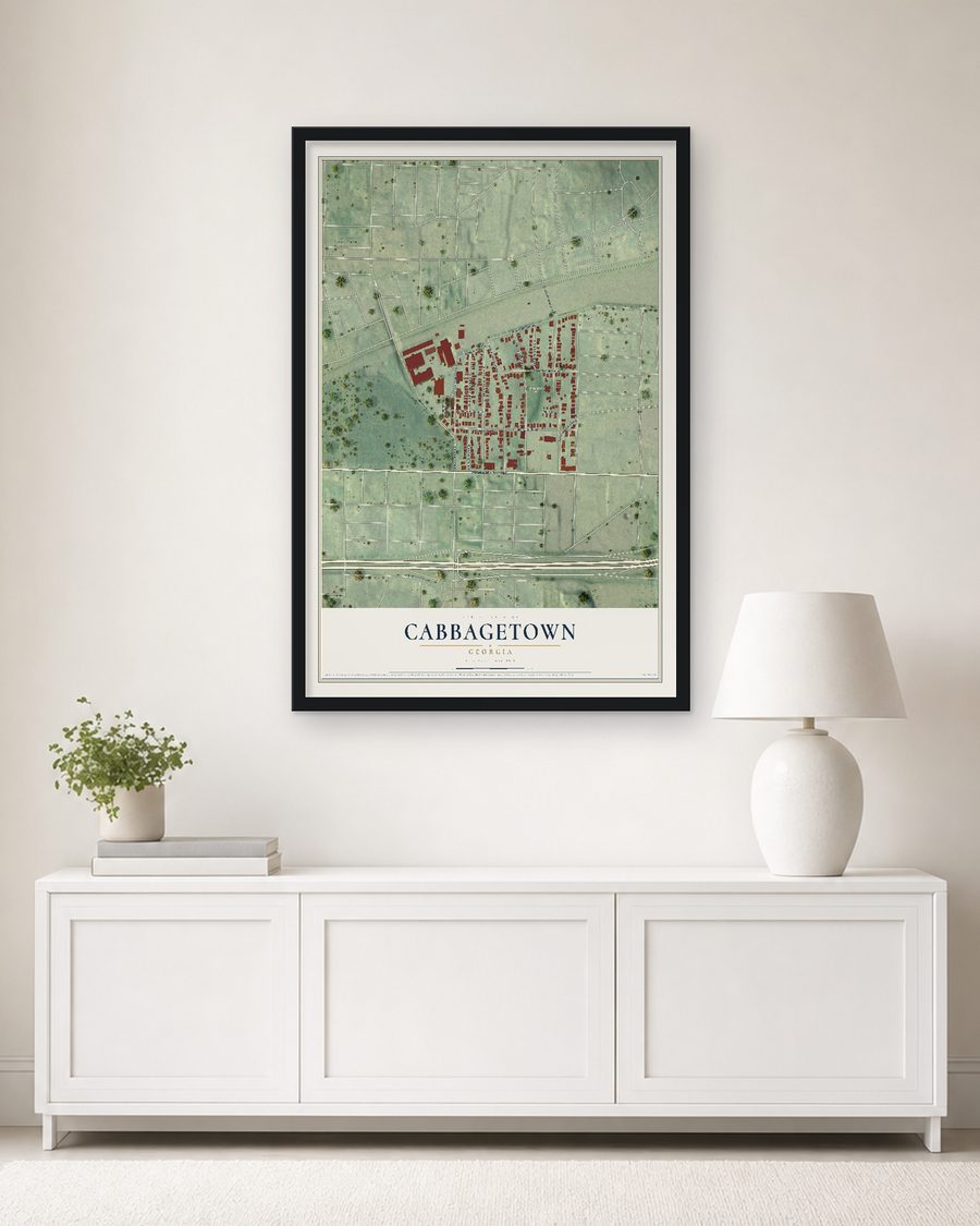 The Cabbagetown, Georgia map, 24 x 36 in, in a black wood frame on a living room wall