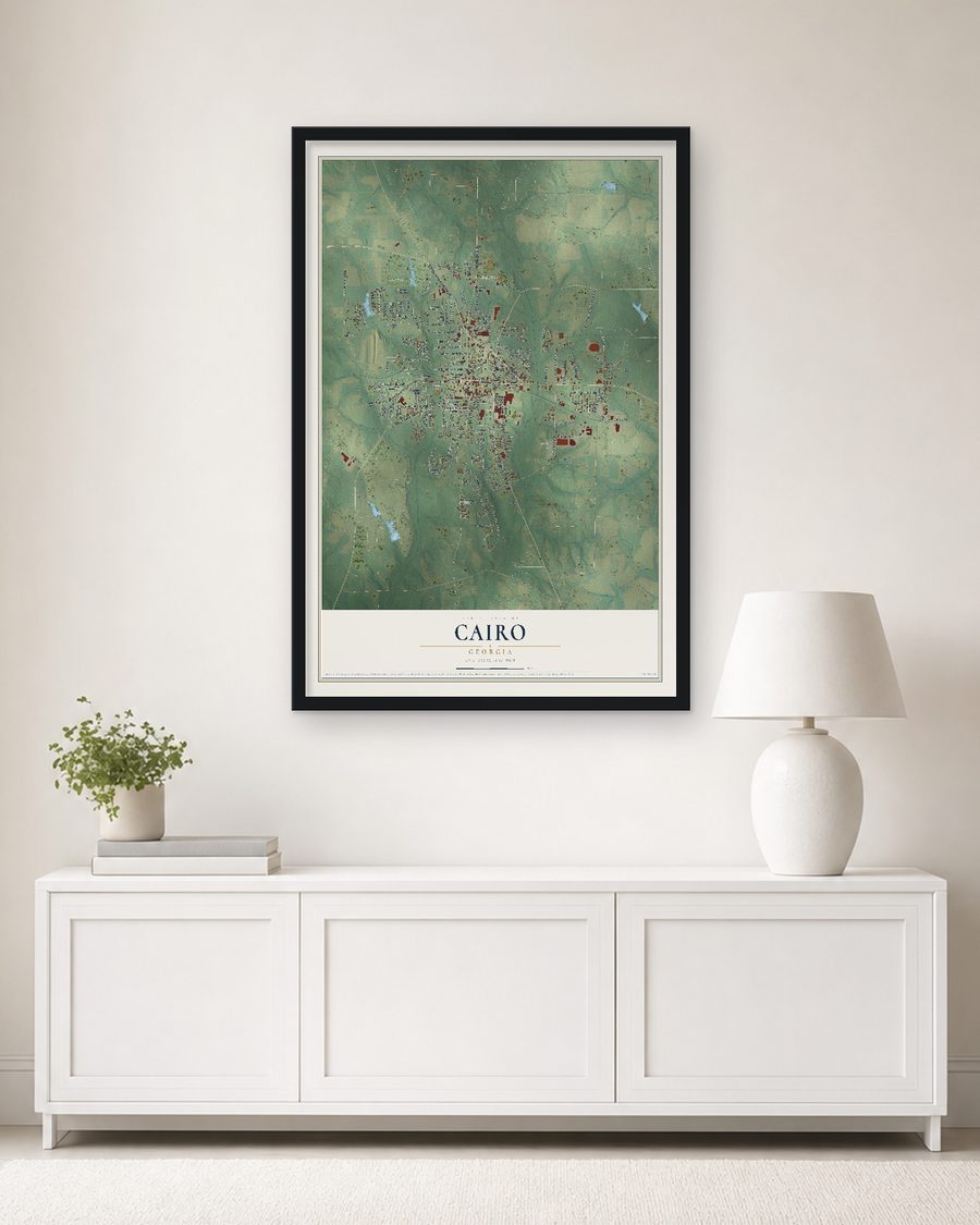 The Cairo, Georgia map, 24 x 36 in, in a black wood frame on a living room wall
