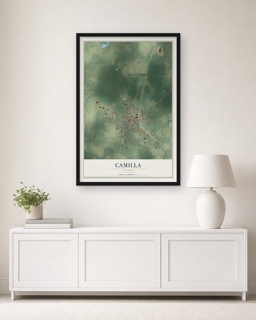The Camilla, Georgia map, 24 x 36 in, in a black wood frame on a living room wall