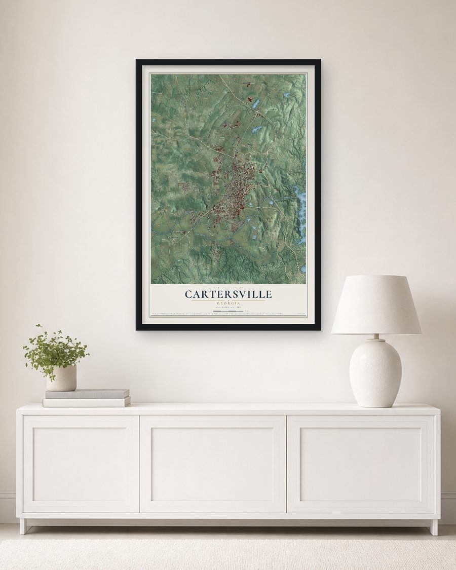 The Cartersville, Georgia map, 24 x 36 in, in a black wood frame on a living room wall