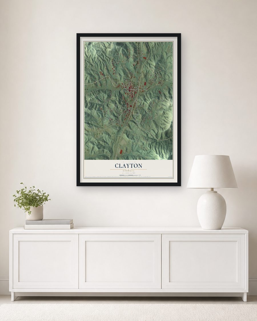 The Clayton, Georgia map, 24 x 36 in, in a black wood frame on a living room wall