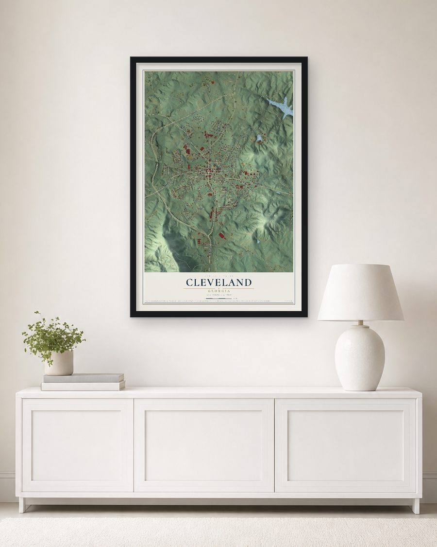 The Cleveland, Georgia map, 24 x 36 in, in a black wood frame on a living room wall