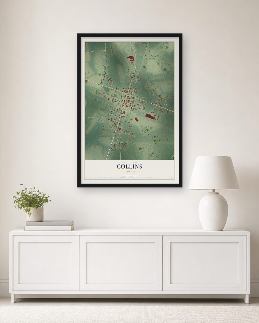 The Collins, Georgia map, 24 x 36 in, in a black wood frame on a living room wall