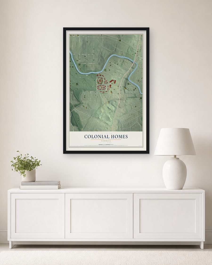 The Colonial Homes, Georgia map, 24 x 36 in, in a black wood frame on a living room wall