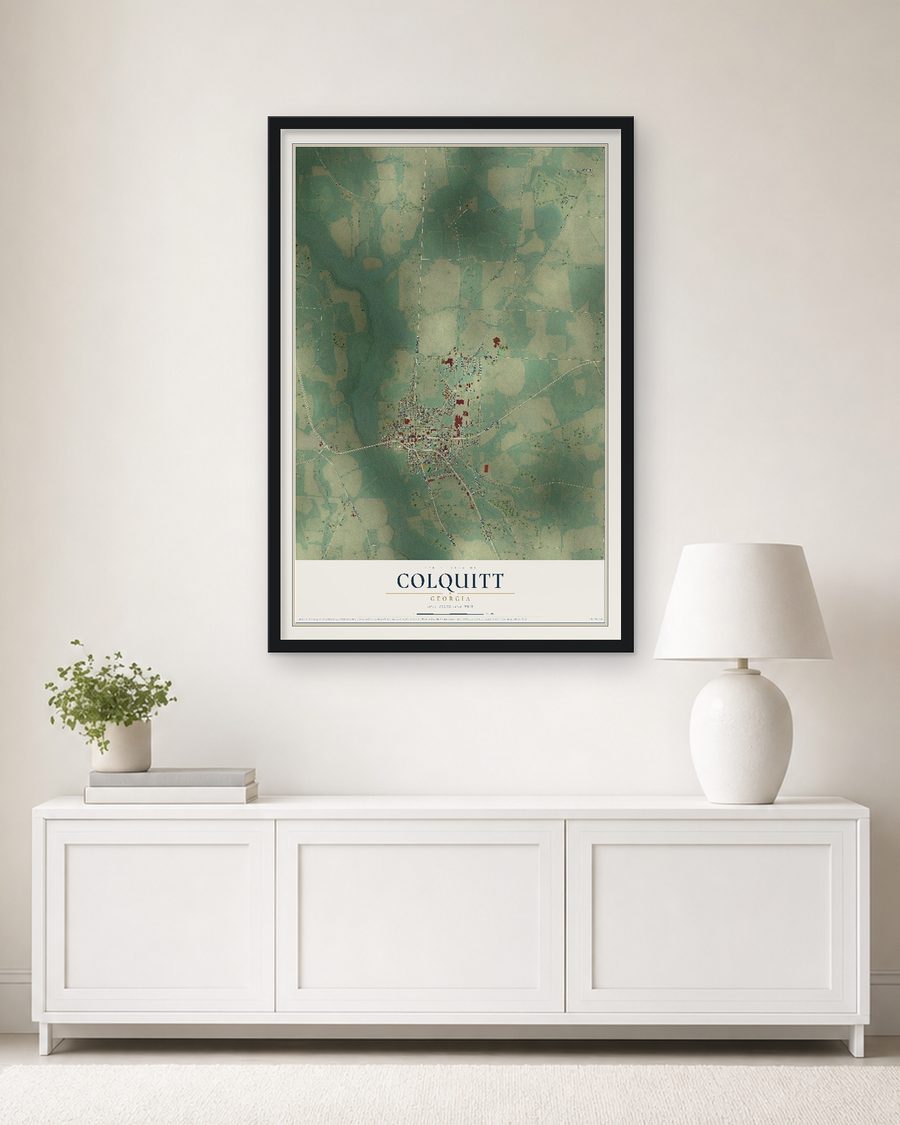 The Colquitt, Georgia map, 24 x 36 in, in a black wood frame on a living room wall