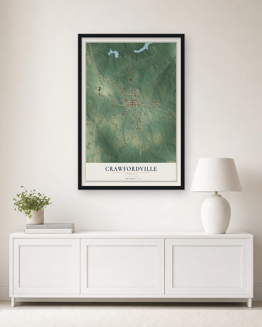 The Crawfordville, Georgia map, 24 x 36 in, in a black wood frame on a living room wall