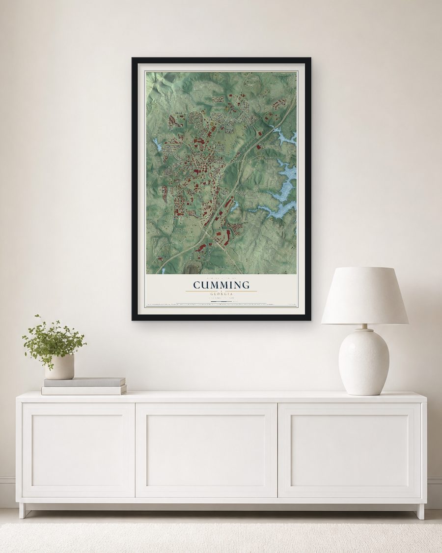 The Cumming, Georgia map, 24 x 36 in, in a black wood frame on a living room wall