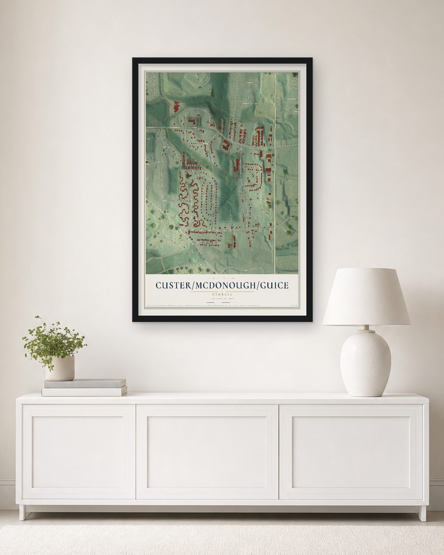 The Custer-McDonough-Guice, Georgia map, 24 x 36 in, in a black wood frame on a living room wall
