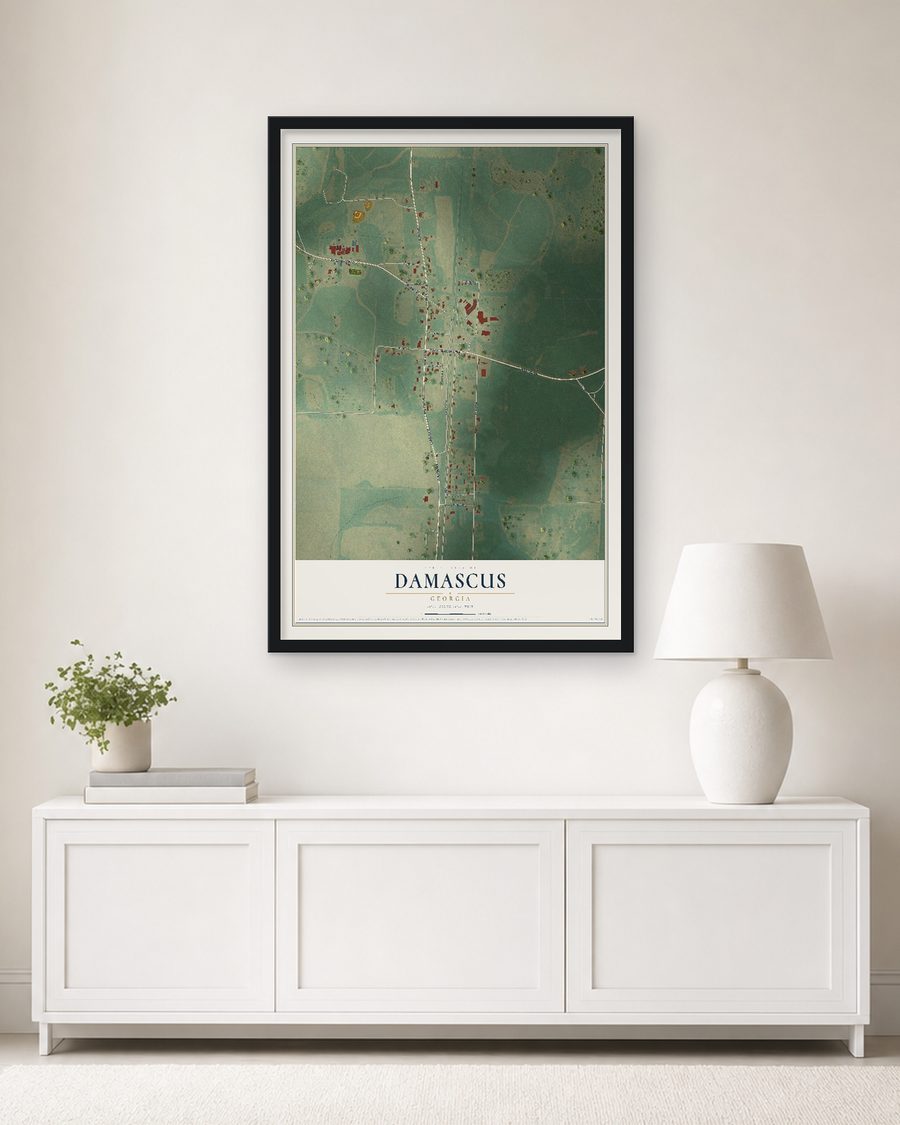The Damascus, Georgia map, 24 x 36 in, in a black wood frame on a living room wall