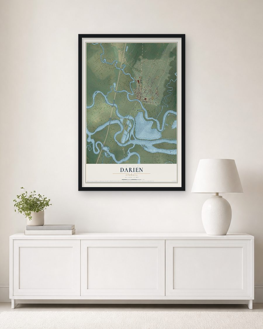 The Darien, Georgia map, 24 x 36 in, in a black wood frame on a living room wall