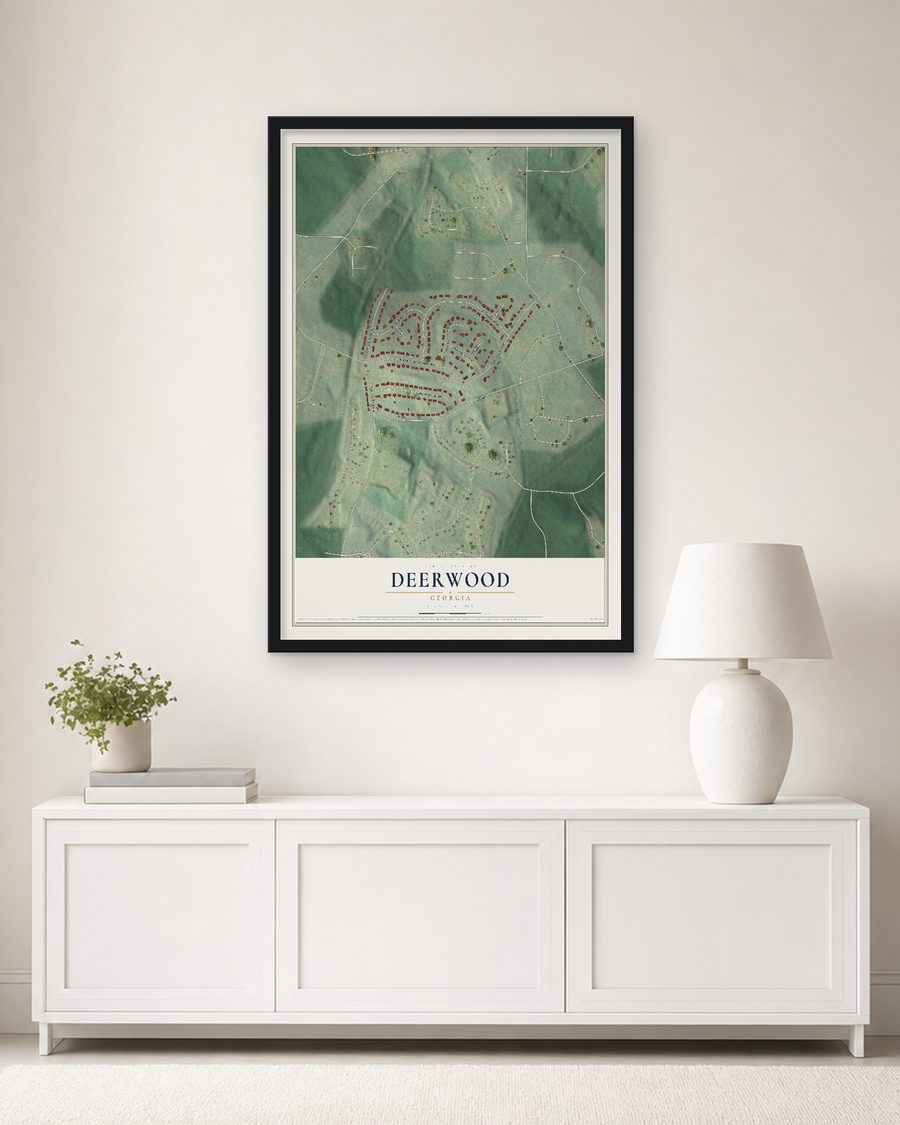 The Deerwood, Georgia map, 24 x 36 in, in a black wood frame on a living room wall