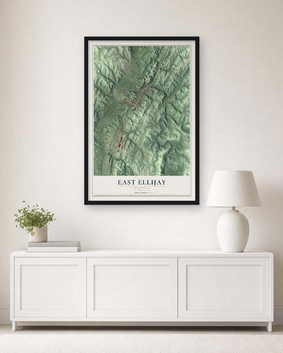 The East Ellijay, Georgia map, 24 x 36 in, in a black wood frame on a living room wall