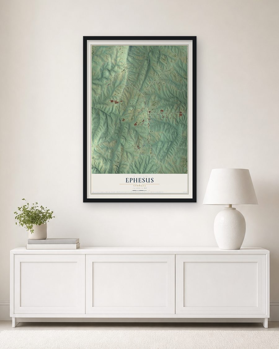 The Ephesus, Georgia map, 24 x 36 in, in a black wood frame on a living room wall