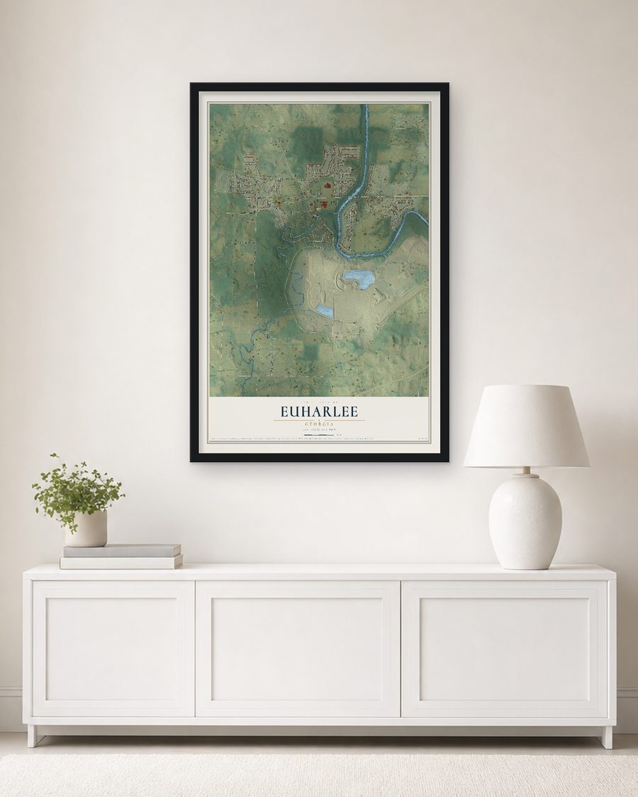 The Euharlee, Georgia map, 24 x 36 in, in a black wood frame on a living room wall