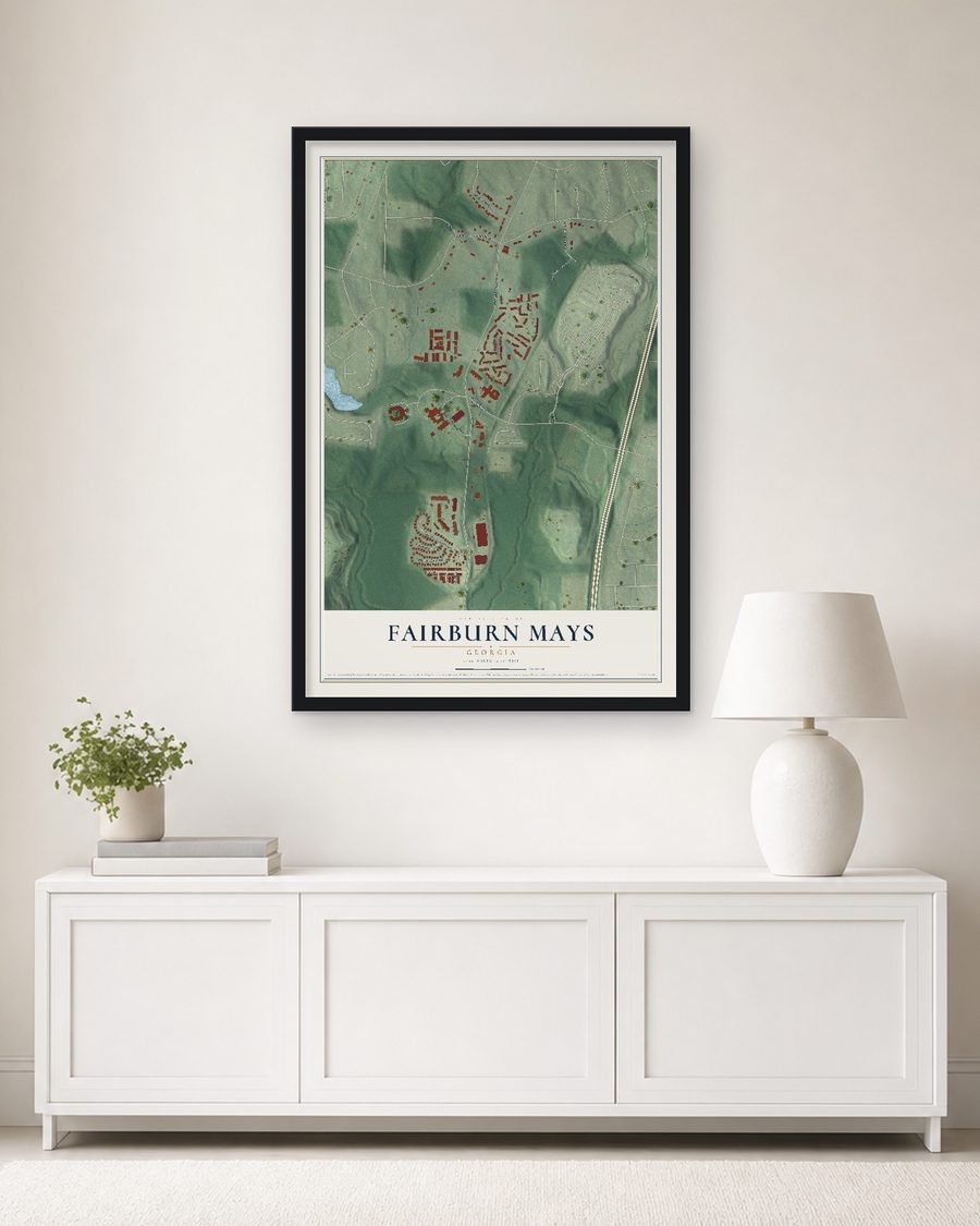 The Fairburn Mays, Georgia map, 24 x 36 in, in a black wood frame on a living room wall