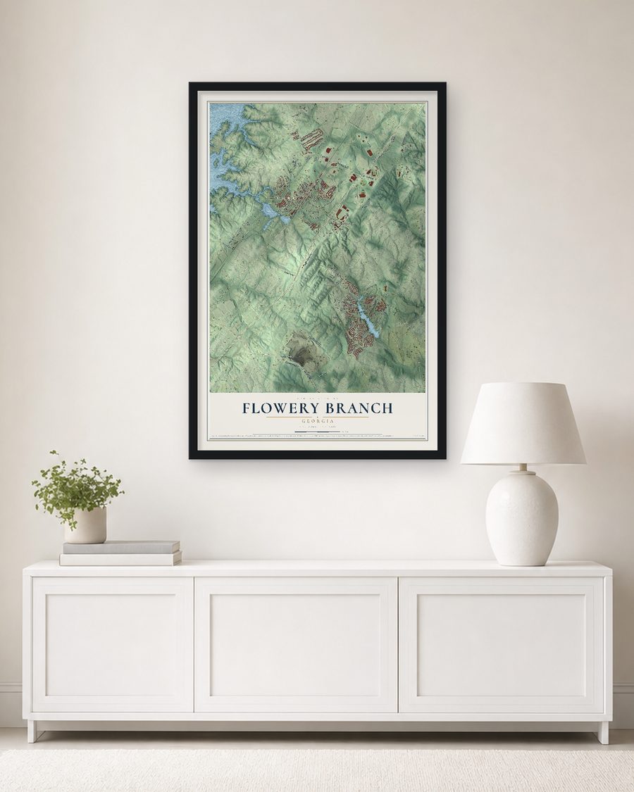 The Flowery Branch, Georgia map, 24 x 36 in, in a black wood frame on a living room wall