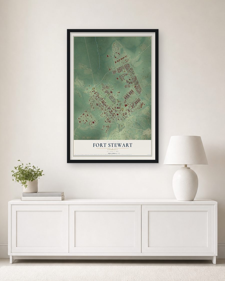 The Fort Stewart, Georgia map, 24 x 36 in, in a black wood frame on a living room wall