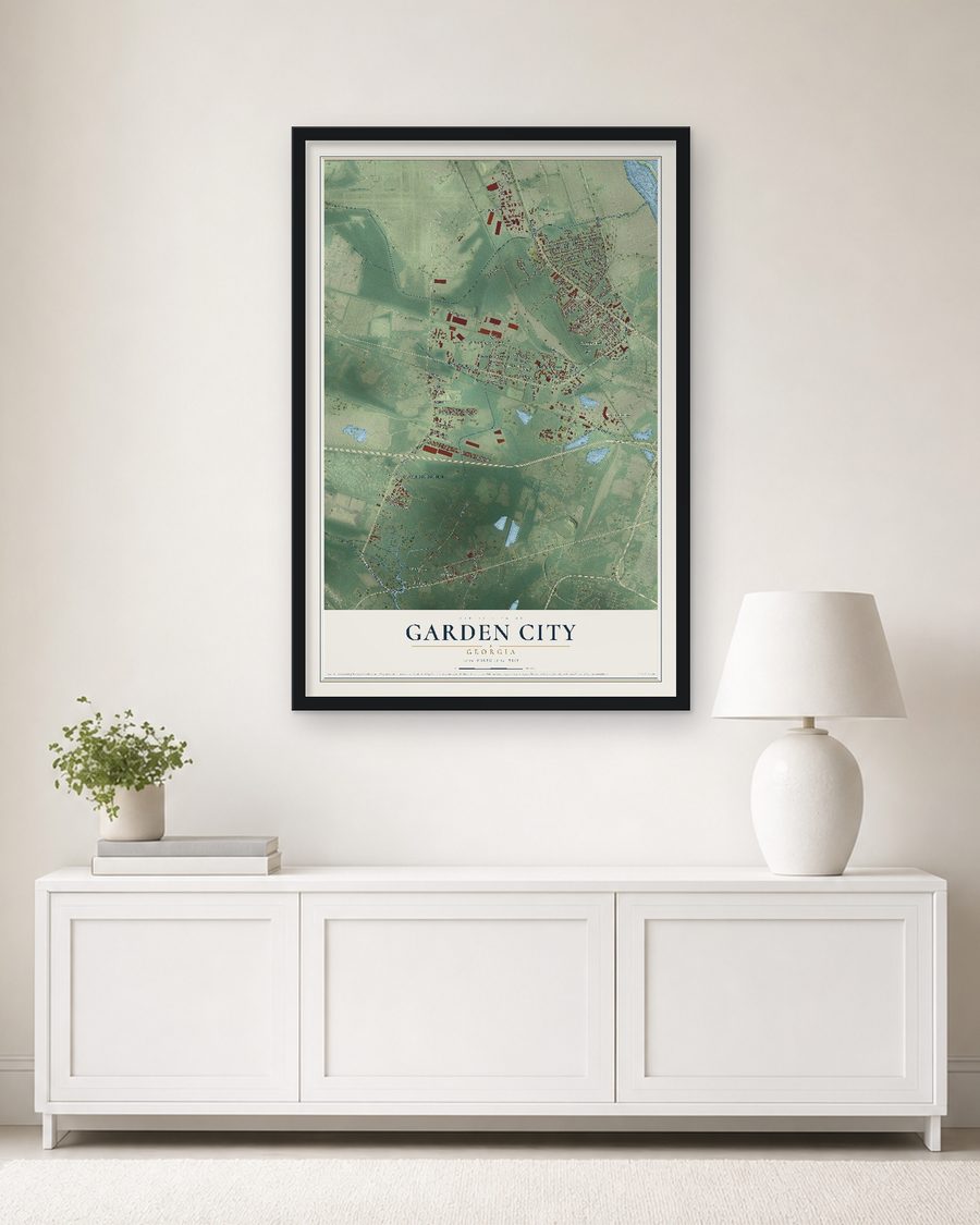 The Garden City, Georgia map, 24 x 36 in, in a black wood frame on a living room wall