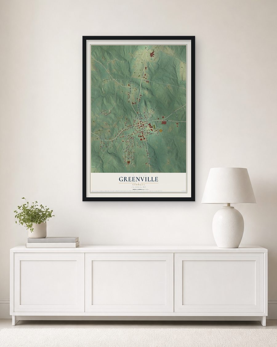 The Greenville, Georgia map, 24 x 36 in, in a black wood frame on a living room wall