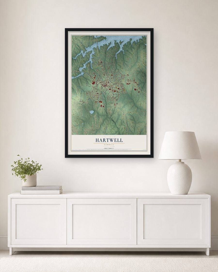 The Hartwell, Georgia map, 24 x 36 in, in a black wood frame on a living room wall