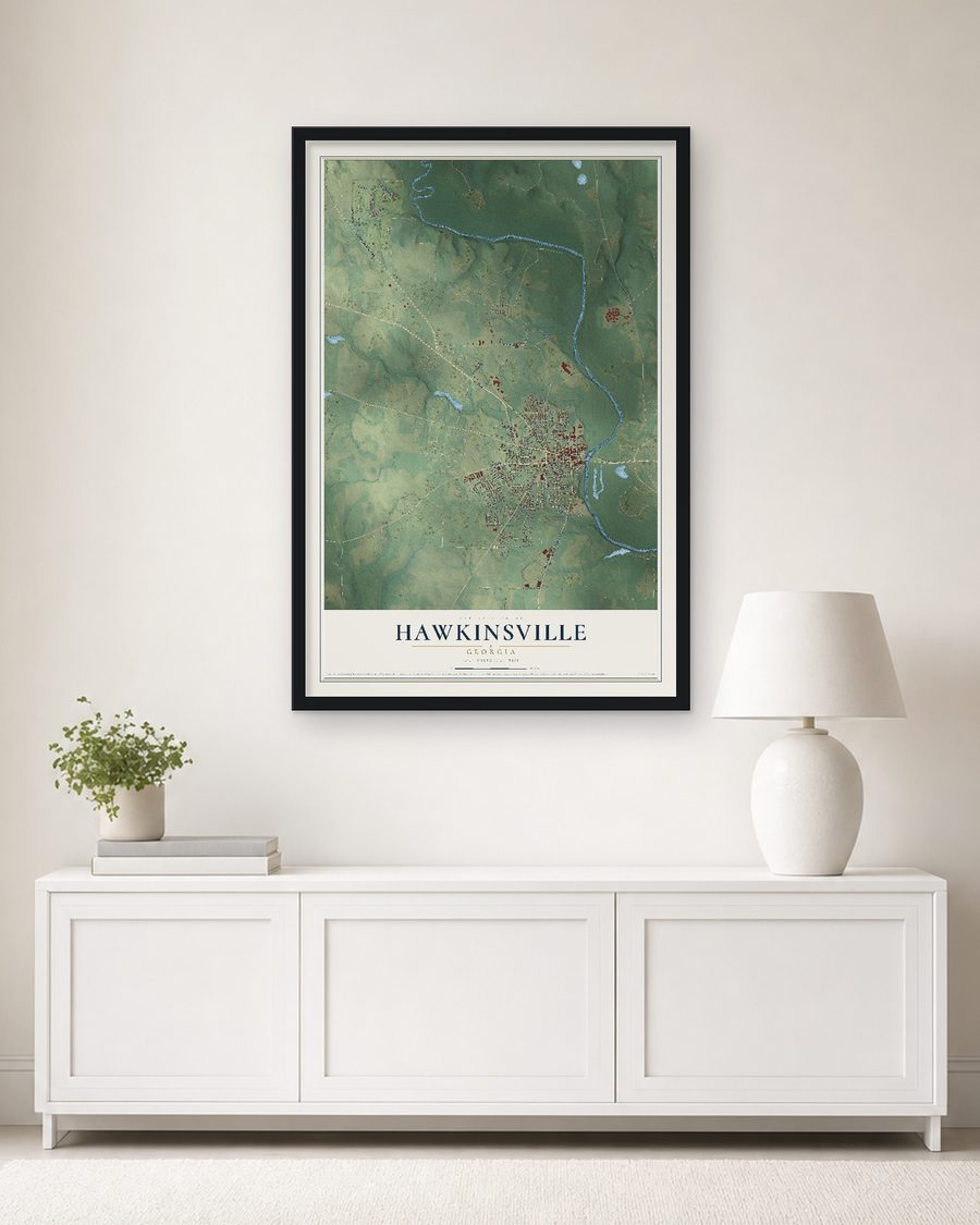 The Hawkinsville, Georgia map, 24 x 36 in, in a black wood frame on a living room wall