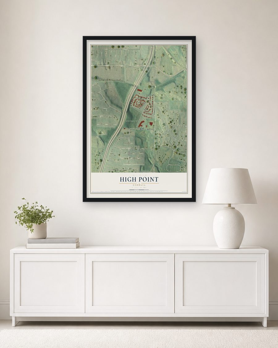 The High Point, Georgia map, 24 x 36 in, in a black wood frame on a living room wall