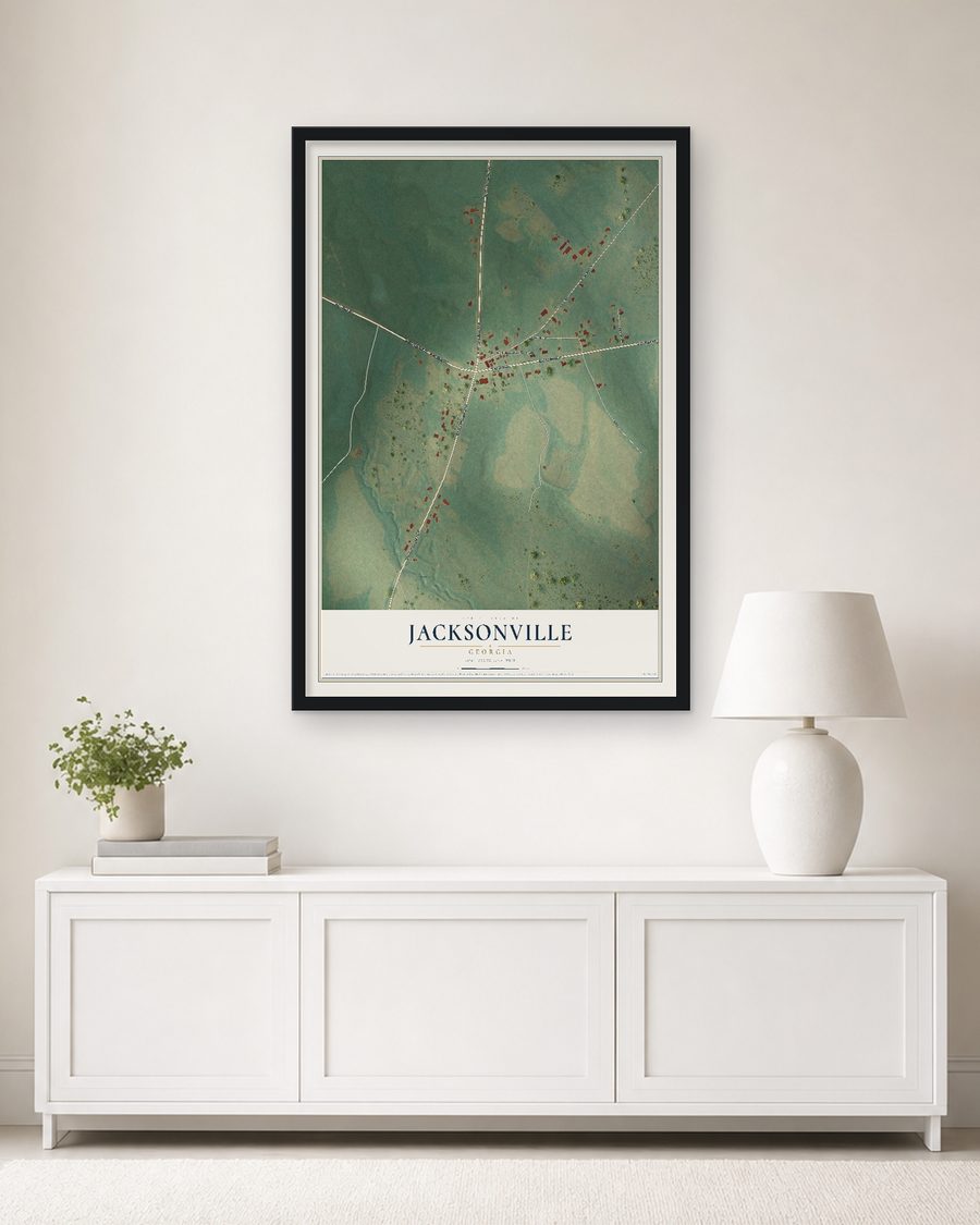 The Jacksonville, Georgia map, 24 x 36 in, in a black wood frame on a living room wall