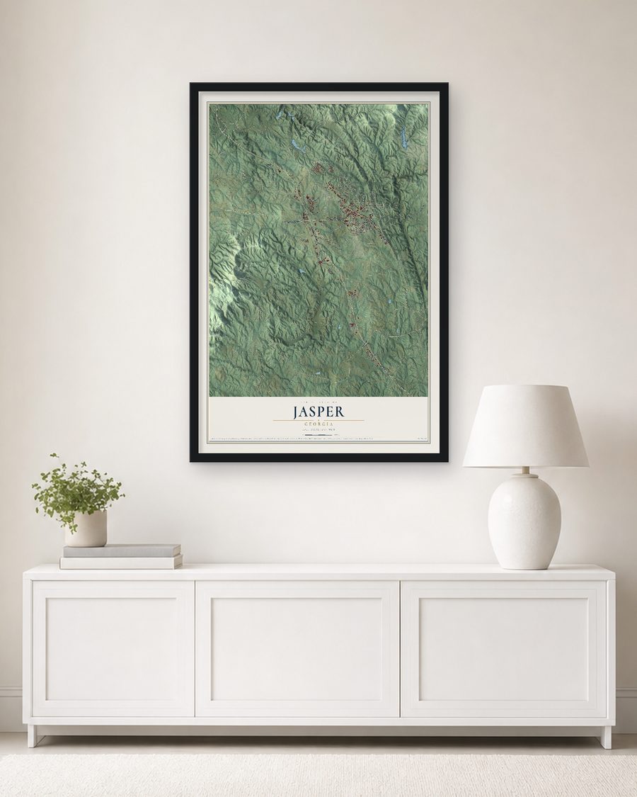 The Jasper, Georgia map, 24 x 36 in, in a black wood frame on a living room wall
