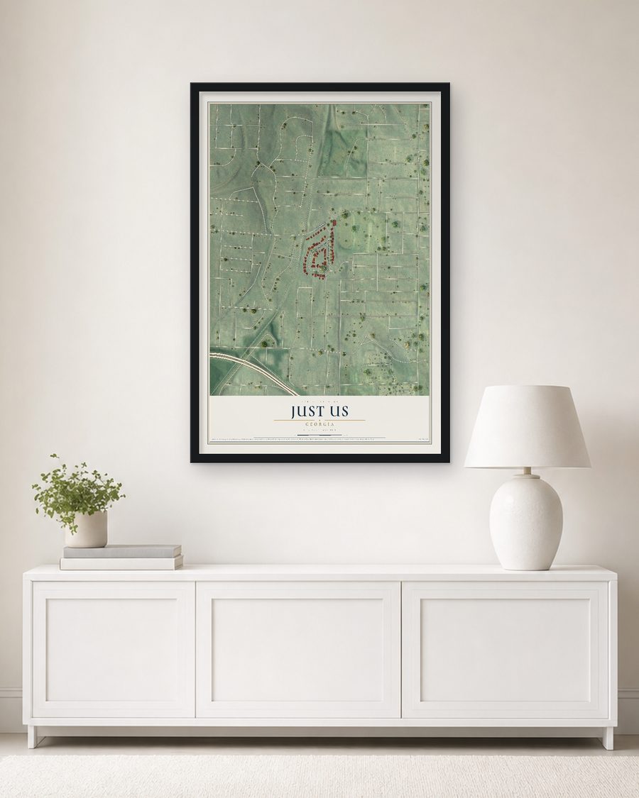 The Just Us, Georgia map, 24 x 36 in, in a black wood frame on a living room wall