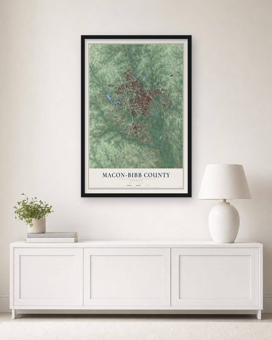 The Macon-Bibb County, Georgia map, 24 x 36 in, in a black wood frame on a living room wall