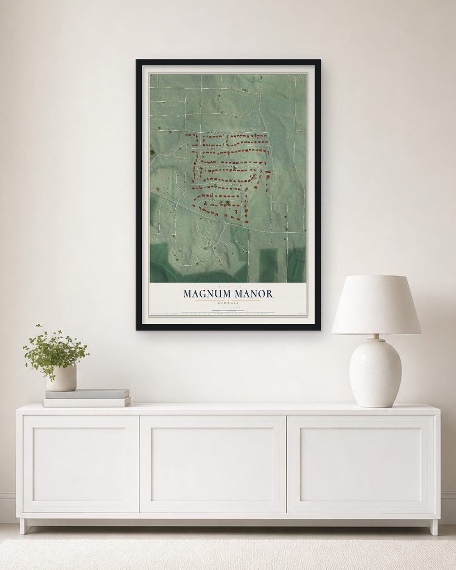 The Magnum Manor, Georgia map, 24 x 36 in, in a black wood frame on a living room wall