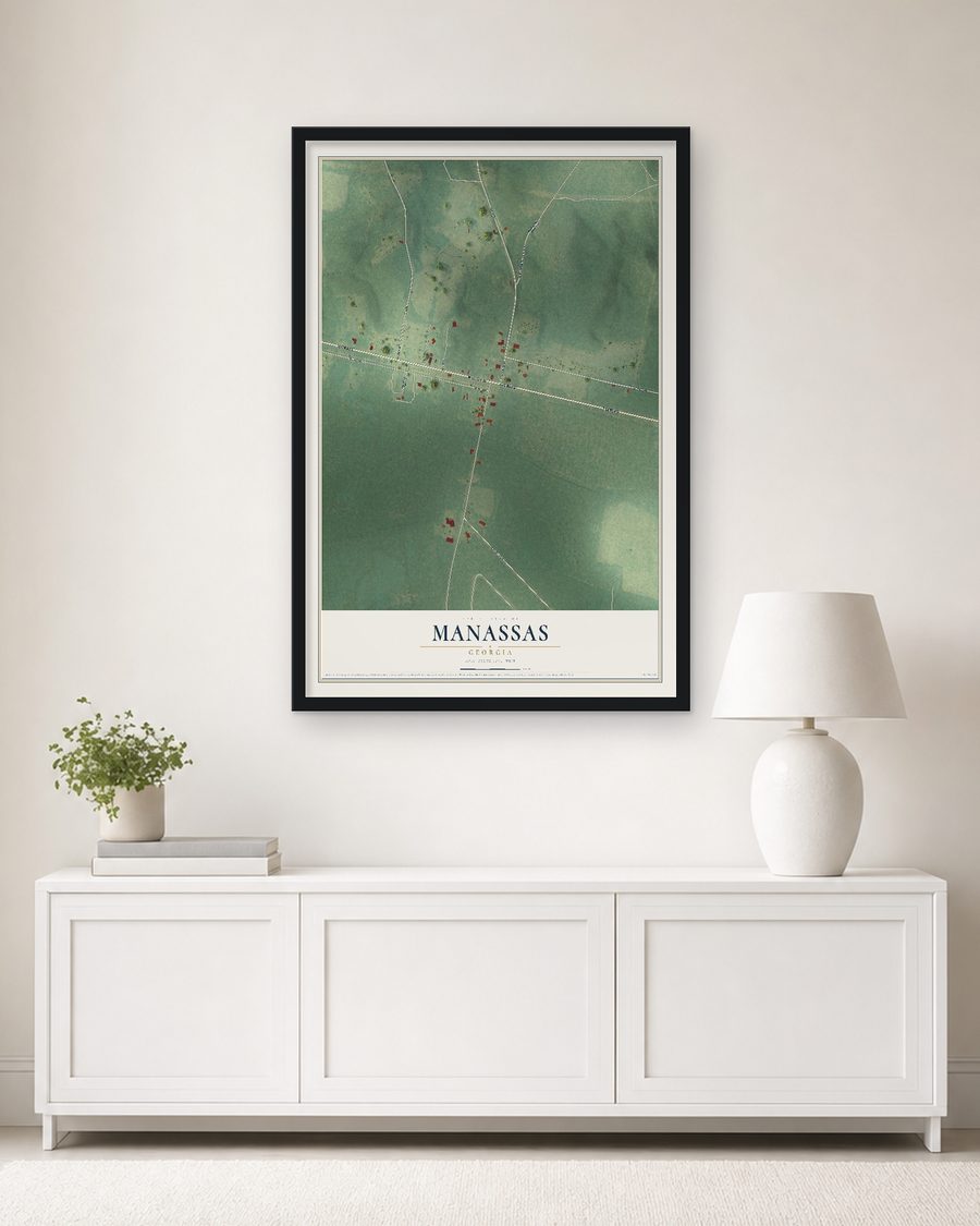 The Manassas, Georgia map, 24 x 36 in, in a black wood frame on a living room wall