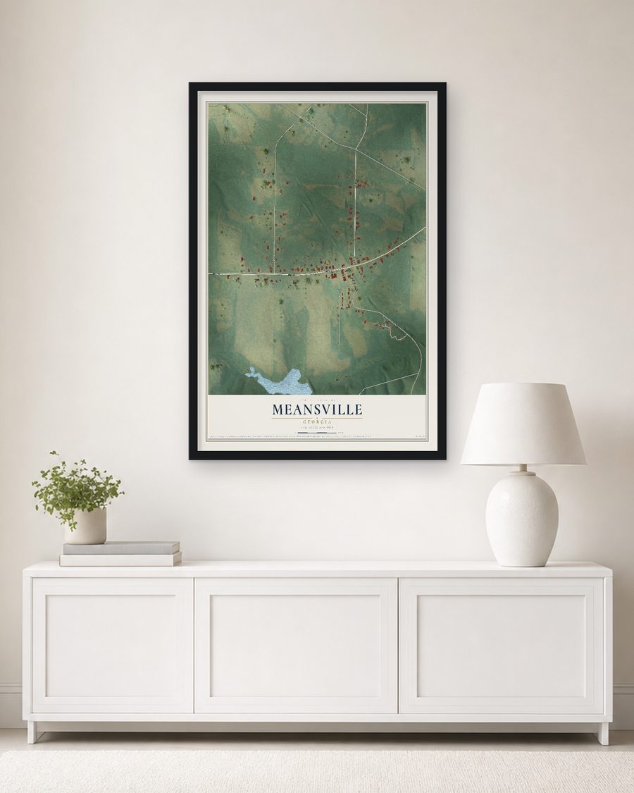 The Meansville, Georgia map, 24 x 36 in, in a black wood frame on a living room wall