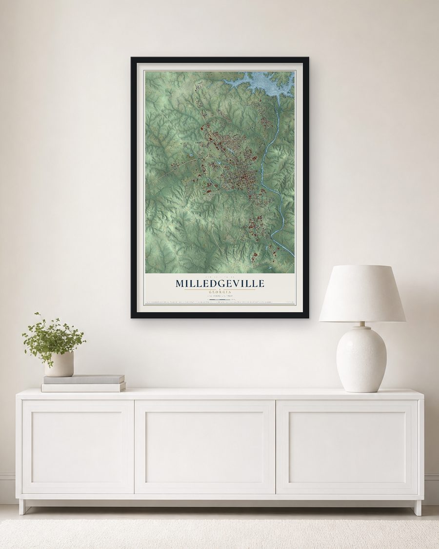 The Milledgeville, Georgia map, 24 x 36 in, in a black wood frame on a living room wall