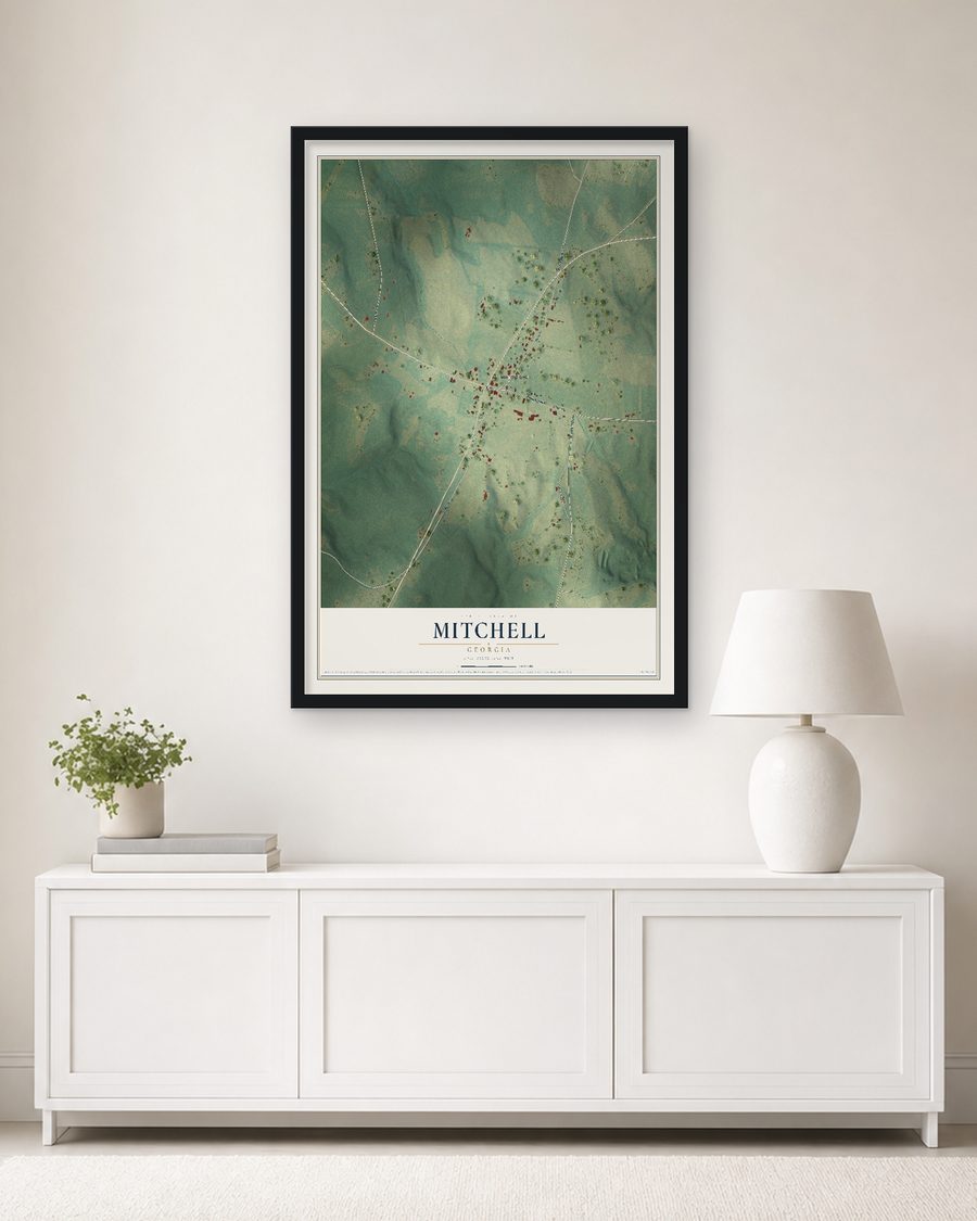 The Mitchell, Georgia map, 24 x 36 in, in a black wood frame on a living room wall