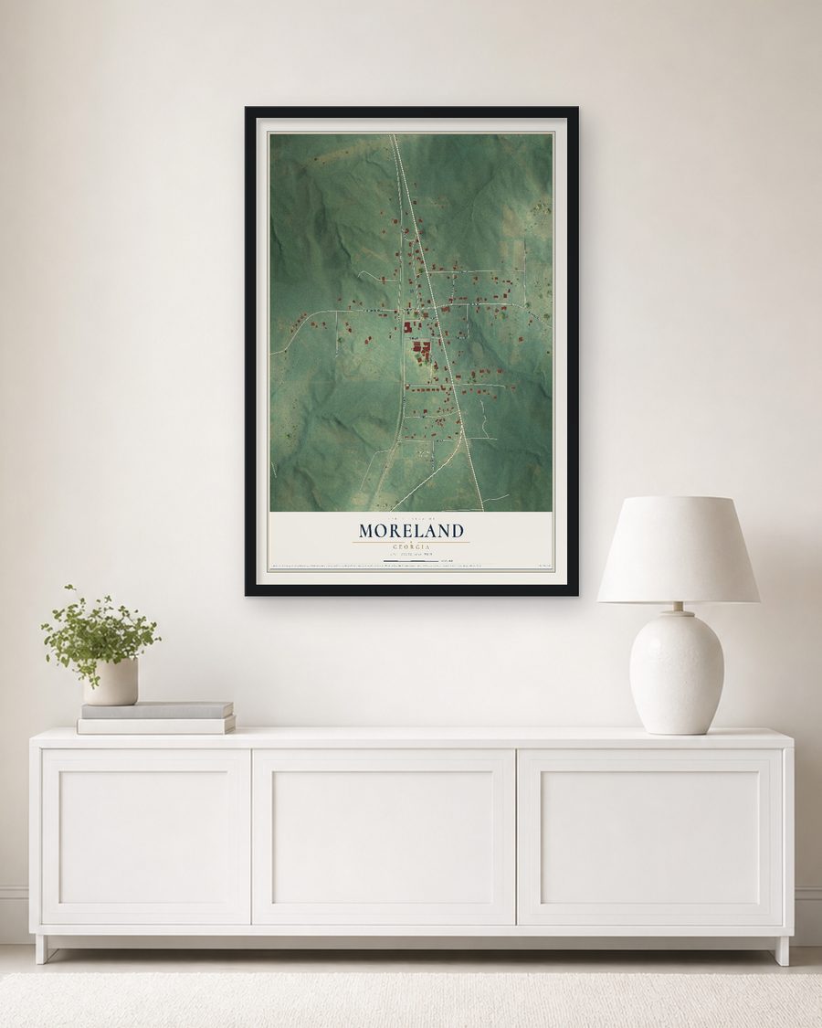 The Moreland, Georgia map, 24 x 36 in, in a black wood frame on a living room wall
