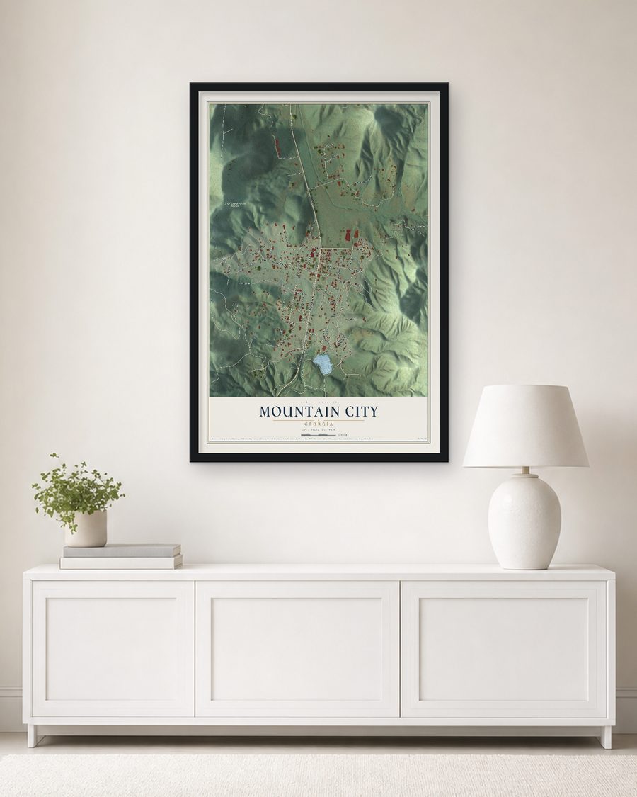 The Mountain City, Georgia map, 24 x 36 in, in a black wood frame on a living room wall